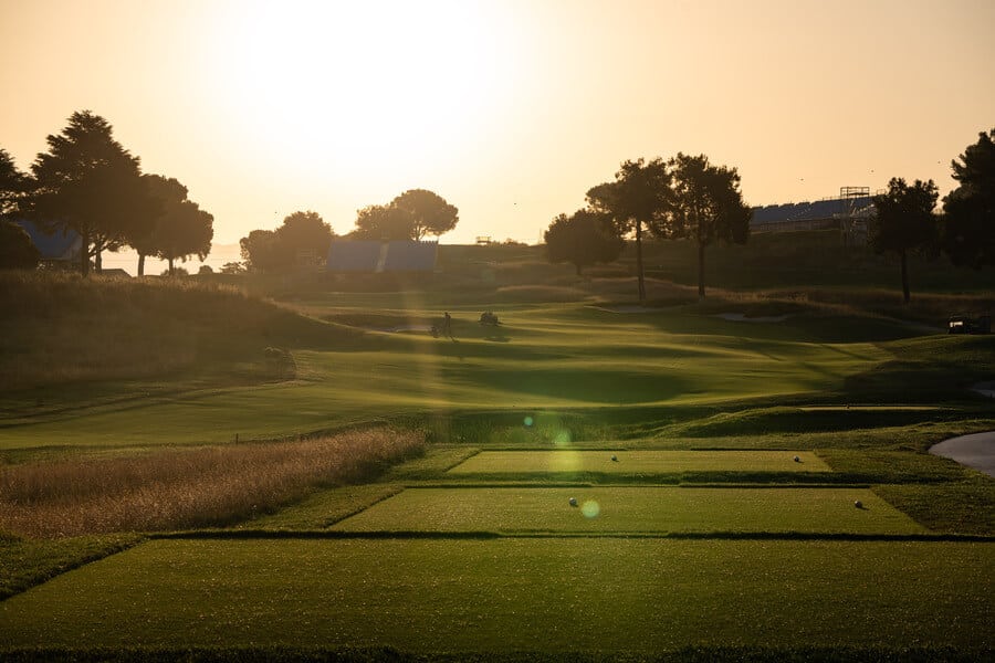 Marco Simone Golf Club with 2023 Ryder Cup grandstands at sunset